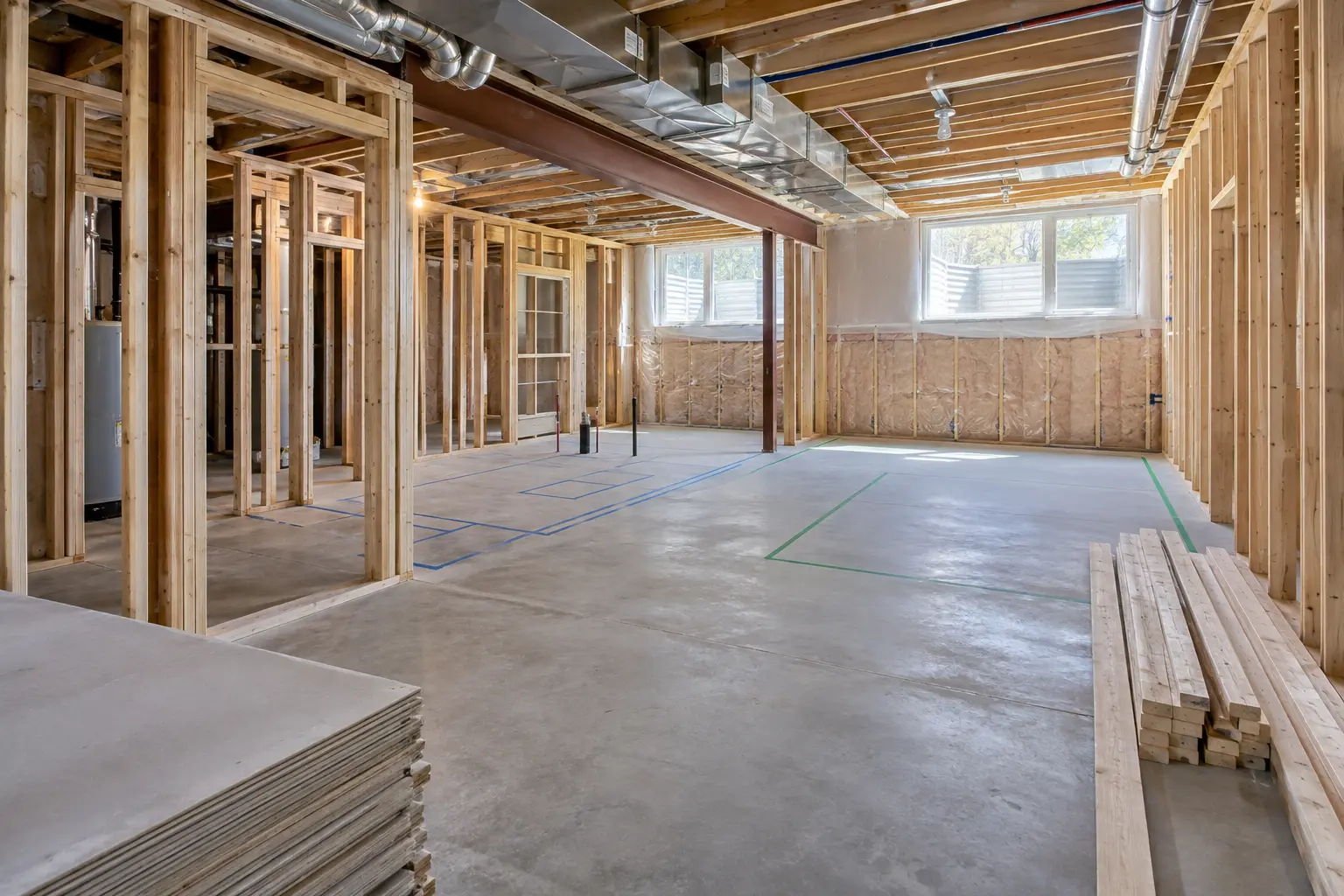Framed Oakville basement showing an accessory-apartment layout taking shape.